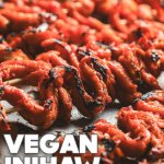 Charred vegan bbq chicken on a skewer, backlit