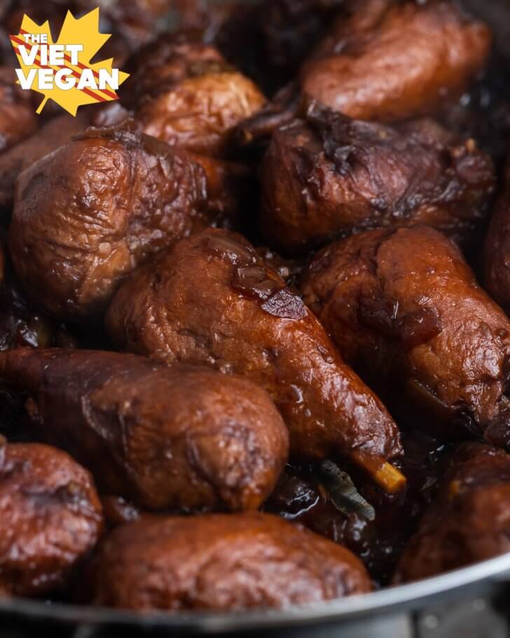 vegan drumsticks in the marinade in the pot, cooking