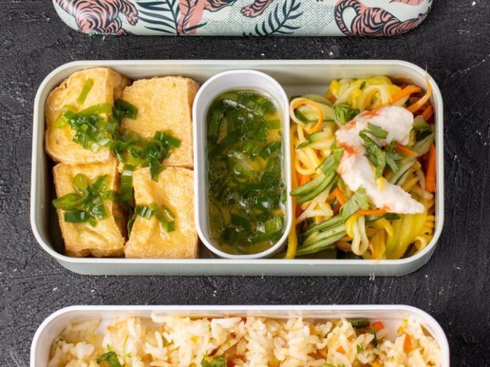 Fried tofu with green onion sauce, green mango salad, and fried rice
