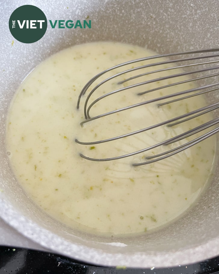 key lime curd in a pot before it has been cooked