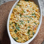 Smoked tofu mixed with vegan mayo spread over rice, baked in an au gratin dish