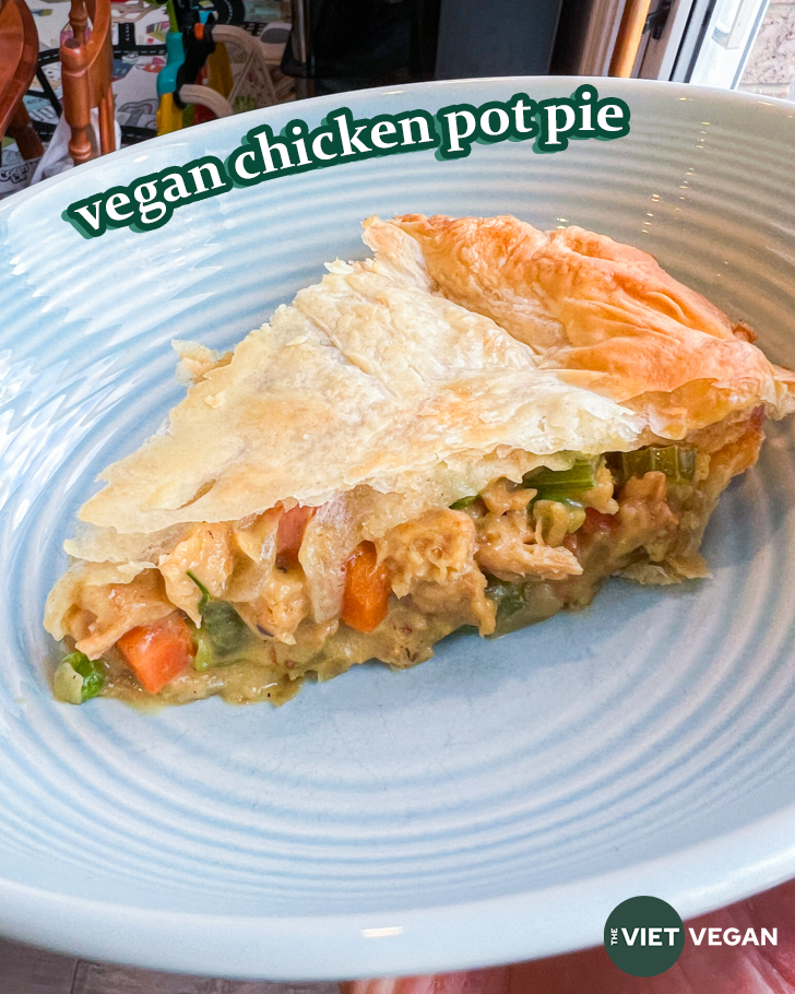 slice of vegan chicken pot pie in a blue bowl